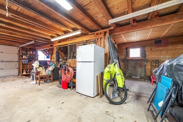 garage with white refrigerator