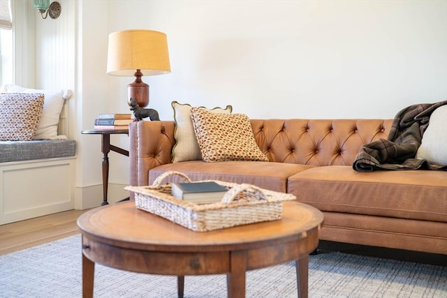 living area with wood finished floors