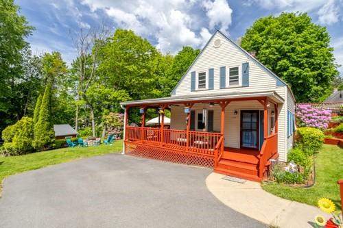 150 Appleton Cir, Fitchburg, MA 01420 - view of front of property featuring a porch and a front lawn
