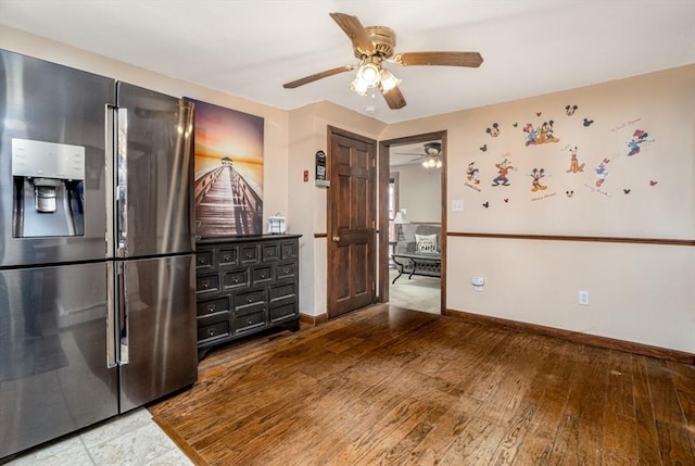 150 Appleton Cir, Fitchburg, MA 01420 - unfurnished bedroom featuring stainless steel fridge with ice dispenser, baseboards, wood finished floors, and ceiling fan