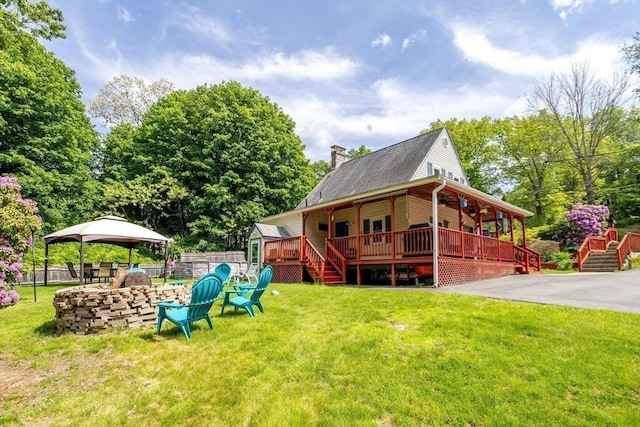150 Appleton Cir, Fitchburg, MA 01420 - back of property with a gazebo, a chimney, and stairs