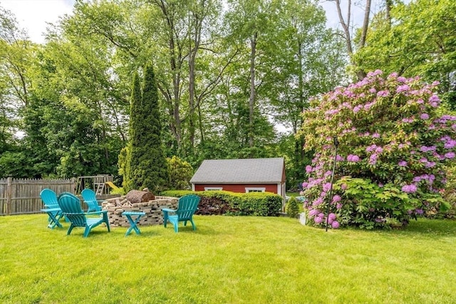 150 Appleton Cir, Fitchburg, MA 01420 - view of yard featuring a fire pit and a playground
