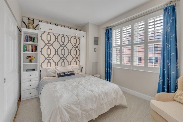 15 River Unit 306, Boston, MA 02108 - carpeted bedroom with baseboards and a closet