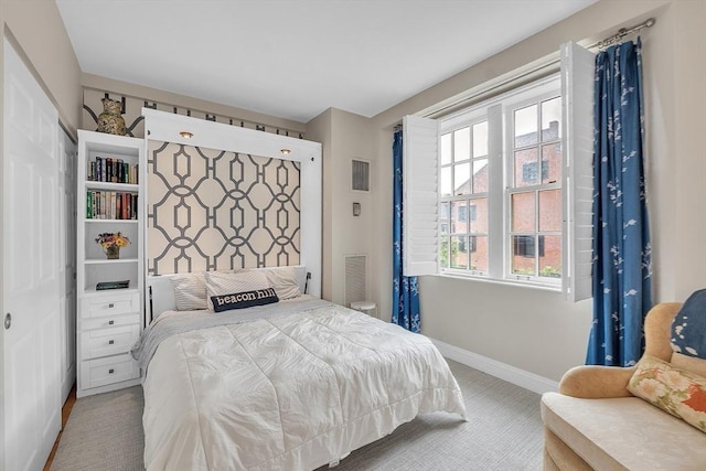 15 River Unit 306, Boston, MA 02108 - bedroom with baseboards and carpet floors