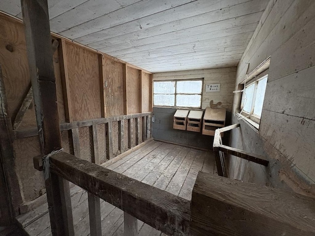 misc room with wood ceiling and hardwood / wood-style flooring