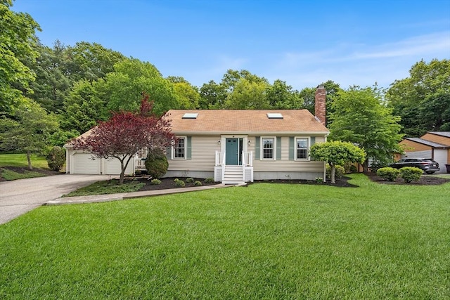 19 K St, Weymouth, MA 02189 - view of front of property with concrete driveway, a front lawn, a chimney, and a garage