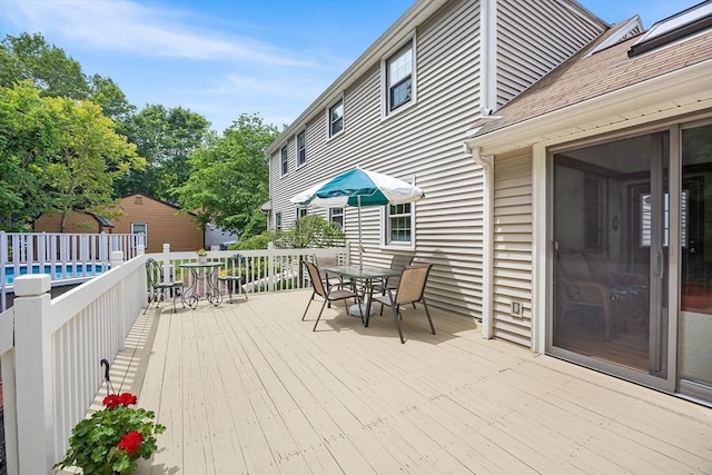 19 K St, Weymouth, MA 02189 - wooden terrace featuring outdoor dining space