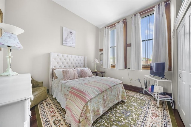 235 State St Unit 317, Springfield, MA 01103 - bedroom with wood finished floors, vaulted ceiling, and baseboards