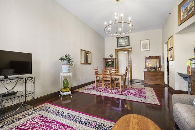 235 State St Unit 317, Springfield, MA 01103 - dining space featuring a chandelier, hardwood / wood-style flooring, and baseboards