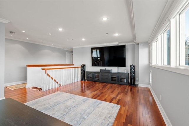 living room featuring wood-type flooring and ornamental molding