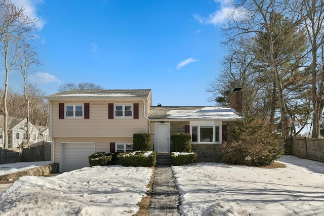 tri-level home featuring a garage