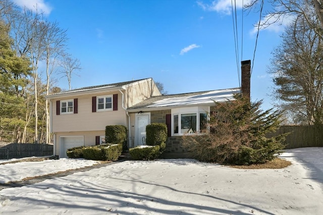 tri-level home featuring a garage