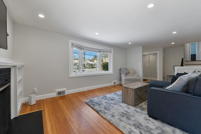 living room with hardwood / wood-style flooring