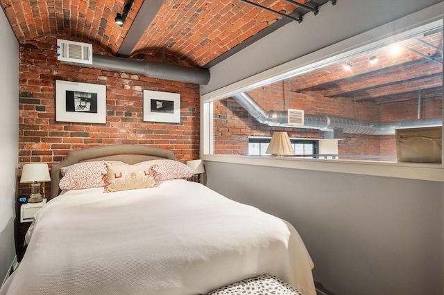 bedroom with brick ceiling