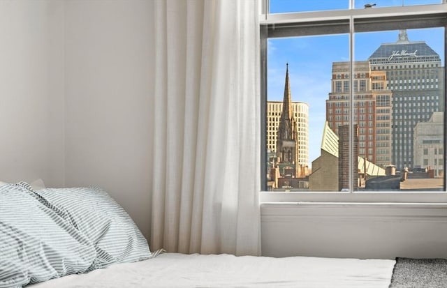 bedroom with a city view