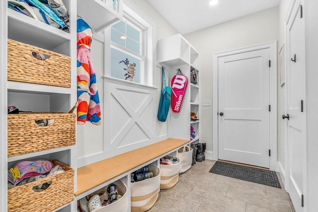 mudroom featuring light tile patterned floors