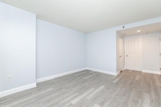 empty room featuring light hardwood / wood-style floors