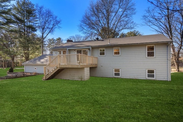 back of house featuring stairway, a wooden deck, and a yard