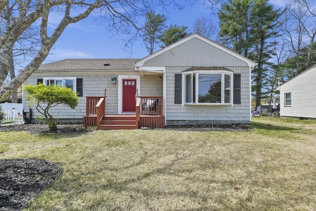 ranch-style house with a front yard