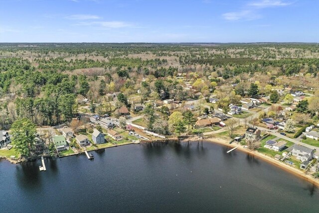 bird's eye view featuring a water view and a residential view