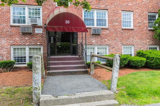 30 Danbury Dr Unit 8, Methuen, MA 01844 - property entrance featuring brick siding