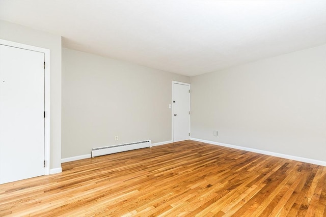 30 Danbury Dr Unit 8, Methuen, MA 01844 - unfurnished room featuring baseboard heating and light wood-type flooring