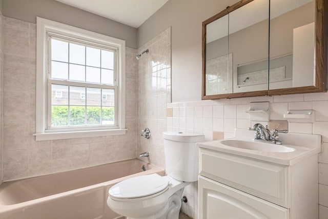 30 Danbury Dr Unit 8, Methuen, MA 01844 - bathroom featuring washtub / shower combination, vanity, and tile walls
