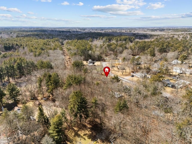 drone / aerial view featuring a view of trees