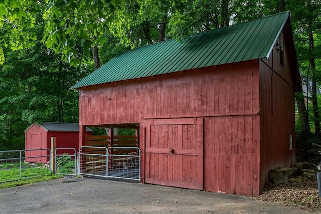 view of outbuilding with an exterior structure and an outdoor structure