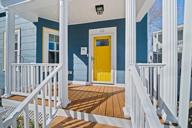 property entrance with covered porch