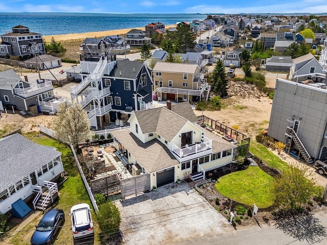 bird's eye view featuring a residential view and a water view