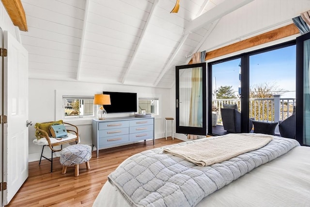 bedroom featuring light wood-type flooring, lofted ceiling with beams, baseboards, and access to outside