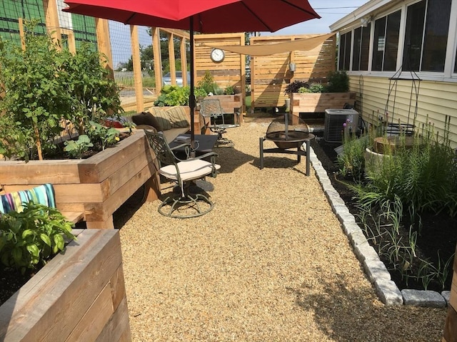 view of yard featuring central AC unit