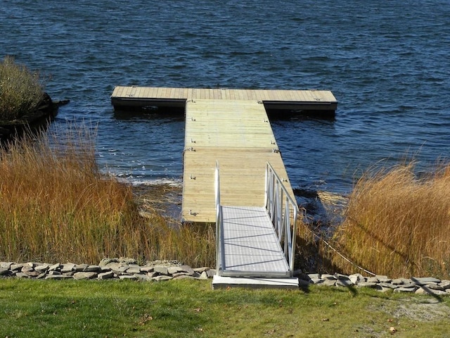 dock area featuring a water view