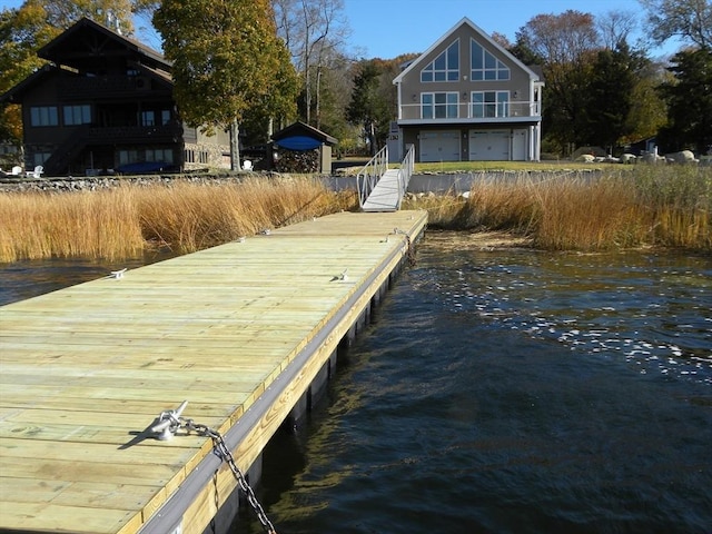 view of dock with a water view