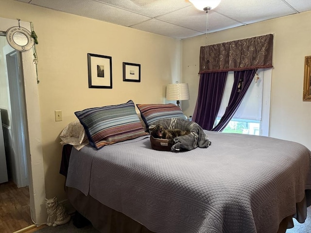 bedroom with wood finished floors