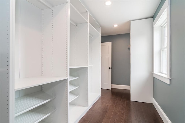 32 Charles St, Natick, MA 01760 - spacious closet featuring dark wood-type flooring