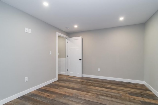 32 Charles St, Natick, MA 01760 - spare room with dark wood-style floors, baseboards, and recessed lighting