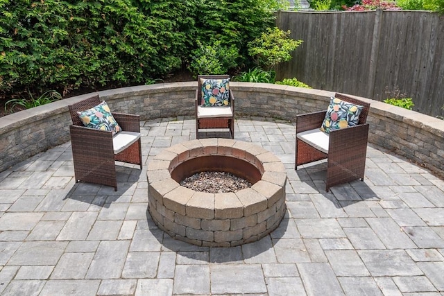32 Charles St, Natick, MA 01760 - view of patio / terrace featuring a fire pit