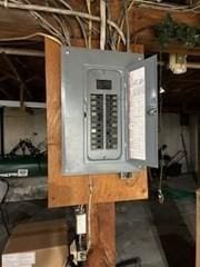 utility room featuring electric panel