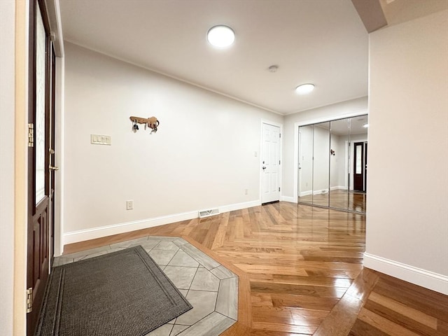 interior space with parquet flooring