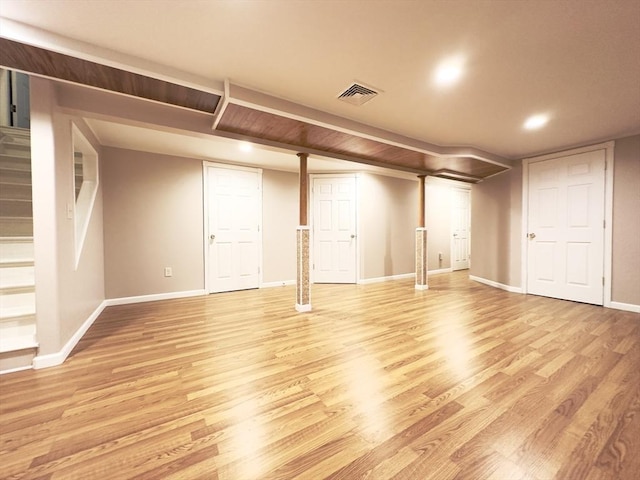 basement featuring light wood-type flooring