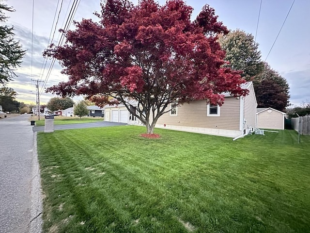 view of yard with a garage