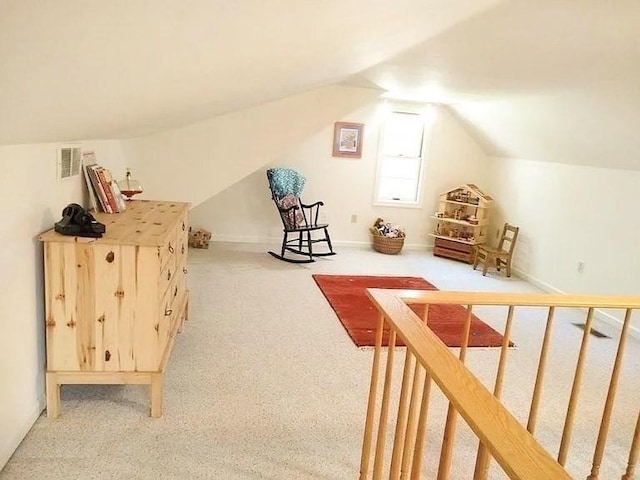 bonus room with visible vents, baseboards, lofted ceiling, and carpet floors