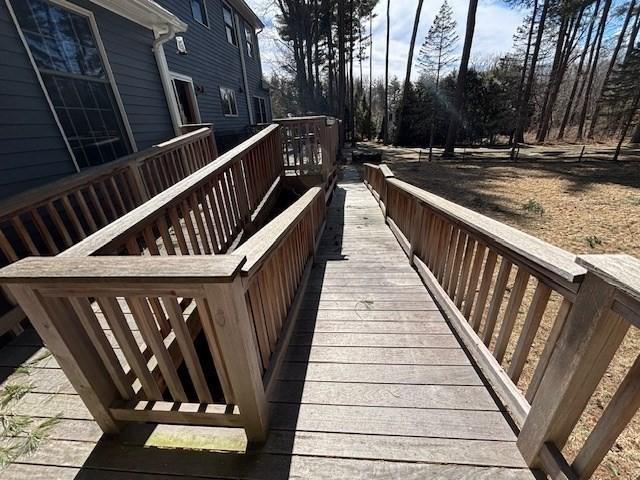 view of home's community with a wooden deck