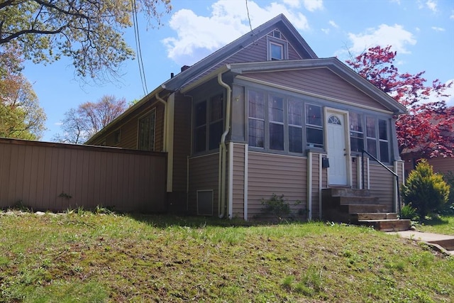 27 Bushwick Pl, Springfield, MA 01109 - bungalow-style house with a sunroom and entry steps