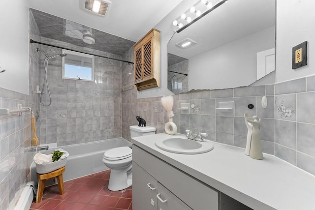 253 Sycamore St Unit 1, Watertown, MA 02472 - full bathroom with a baseboard heating unit, tile walls, tile patterned flooring, shower / washtub combination, and toilet