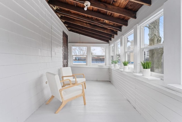 253 Sycamore St Unit 1, Watertown, MA 02472 - sunroom featuring healthy amount of natural light, wooden ceiling, and wood finished floors