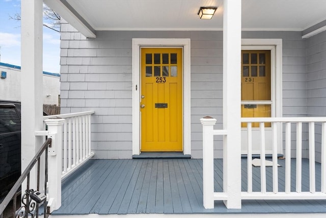 253 Sycamore St Unit 1, Watertown, MA 02472 - doorway to property featuring covered porch
