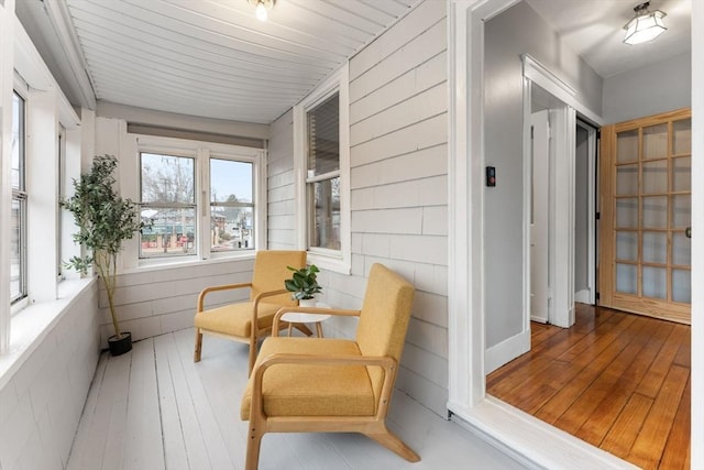 253 Sycamore St Unit 1, Watertown, MA 02472 - sunroom with hardwood / wood-style floors